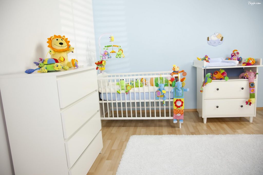 wonderful-bedroom-for-a-newborn-baby-with-white-crib-and-cute-animals-decoration